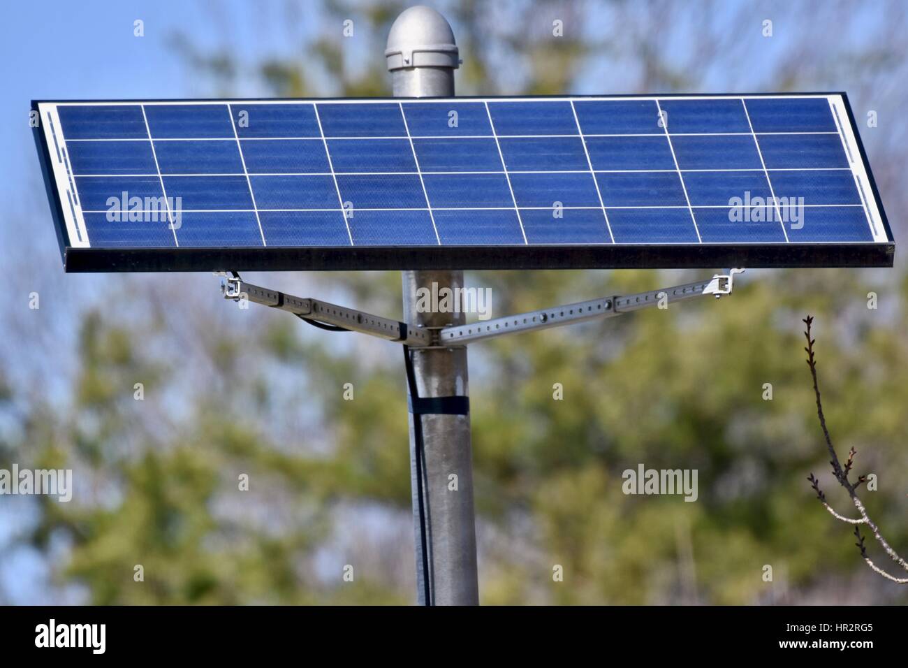 Solar panel powering a speed sign Stock Photo