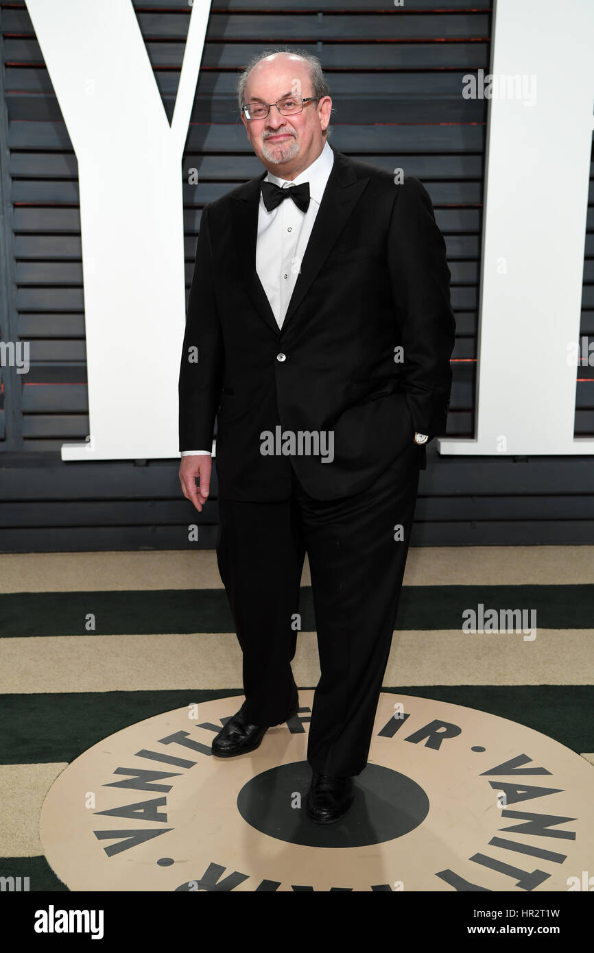 Salman Rushdie arriving at the Vanity Fair Oscar Party in Beverly Hills, Los Angeles, USA. Stock Photo