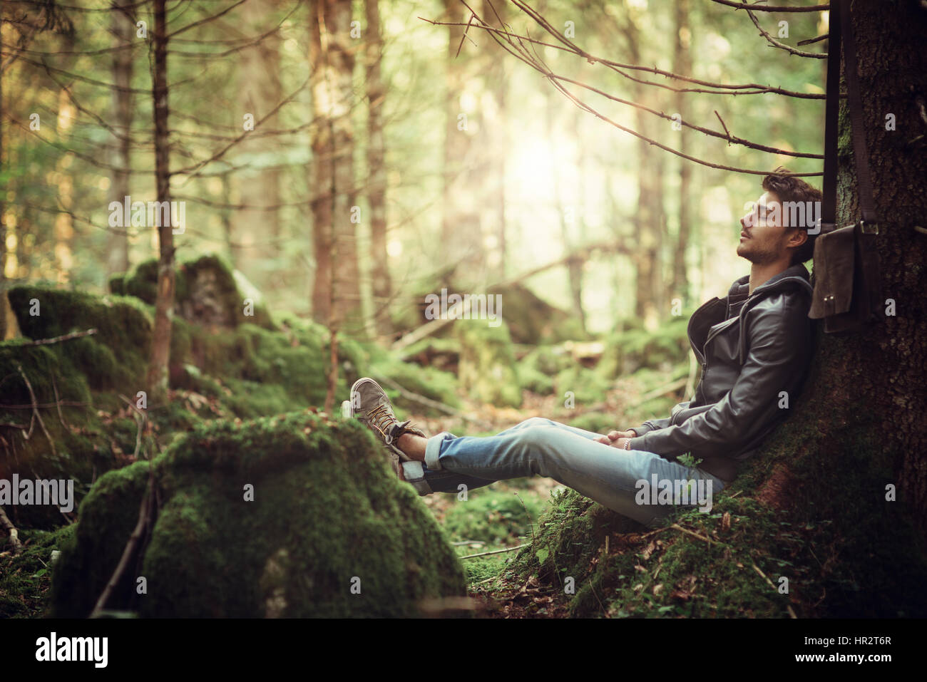 Man sleeping in the forest hi-res stock photography and images - Alamy
