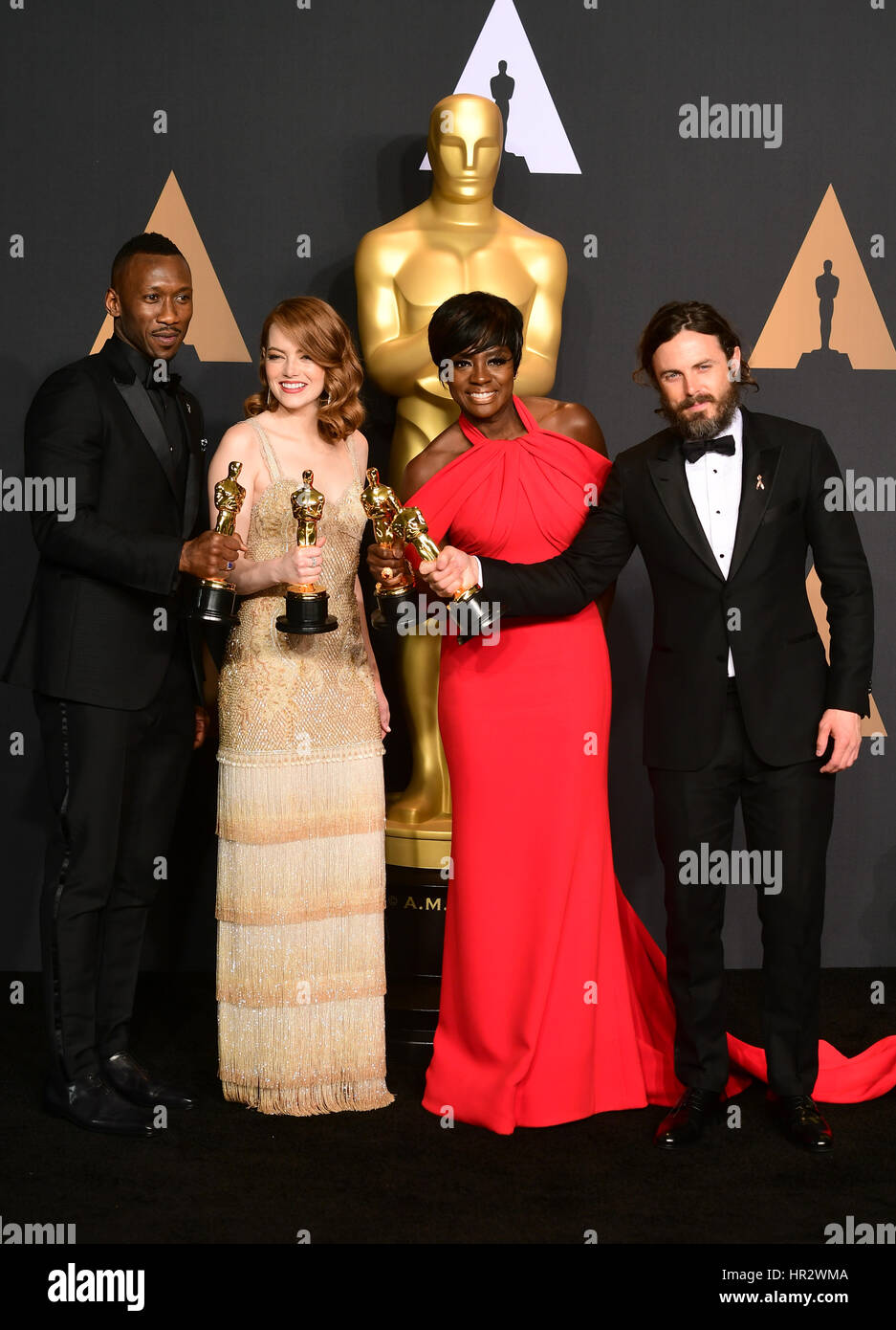 (left to right) Mahershala Ali with the award for Best Supporting Actor, Emma Stone with the award for Best Actress, Viola Davis with the award for Best Supporting Actress and Casey Affleck with the award for Best Actor in the press room at the 89th Academy Awards held at the Dolby Theatre in Hollywood, Los Angeles, USA. Stock Photo