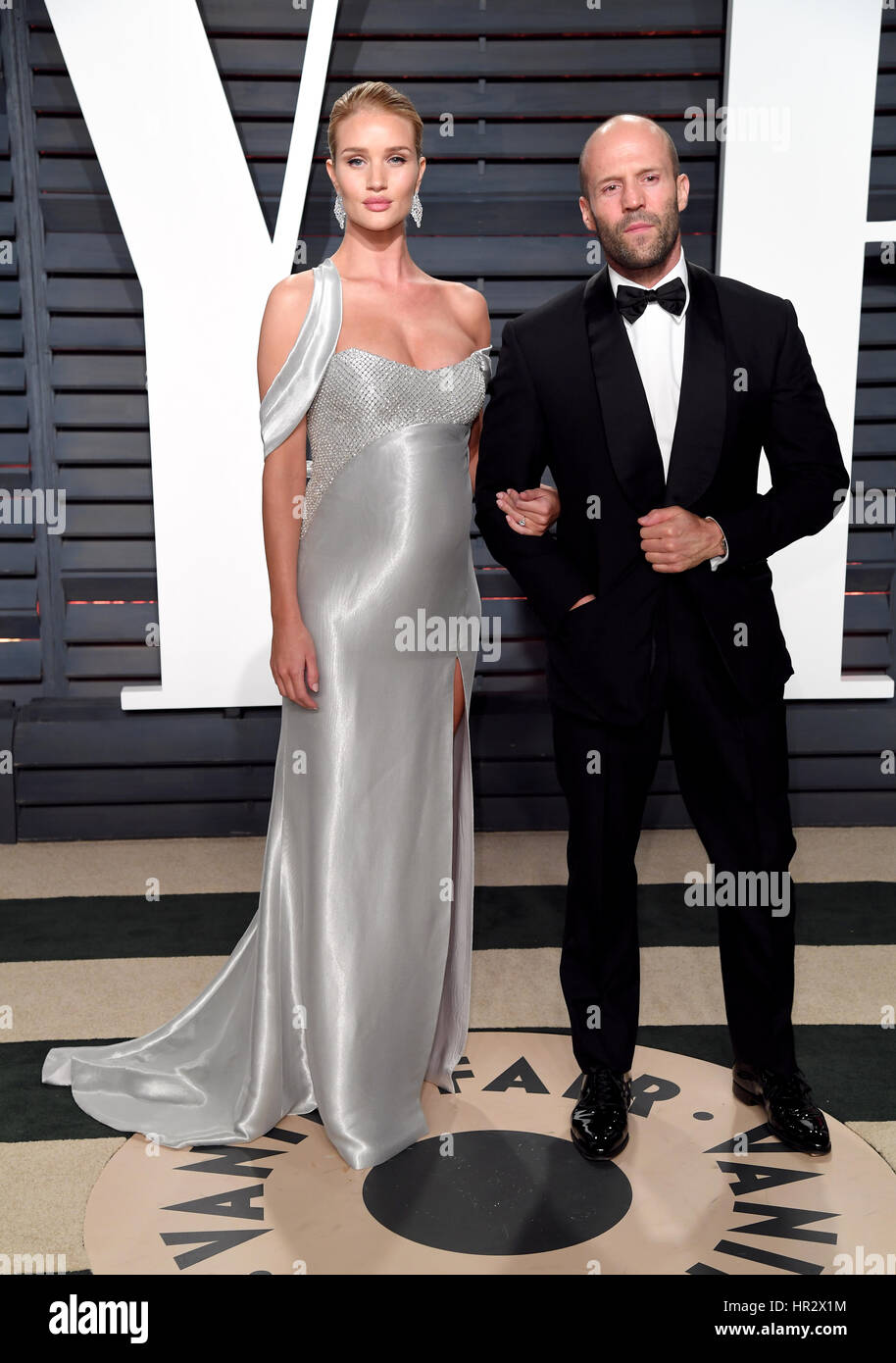 Rosie Huntington-Whiteley and Jason Statham arriving at the Vanity Fair