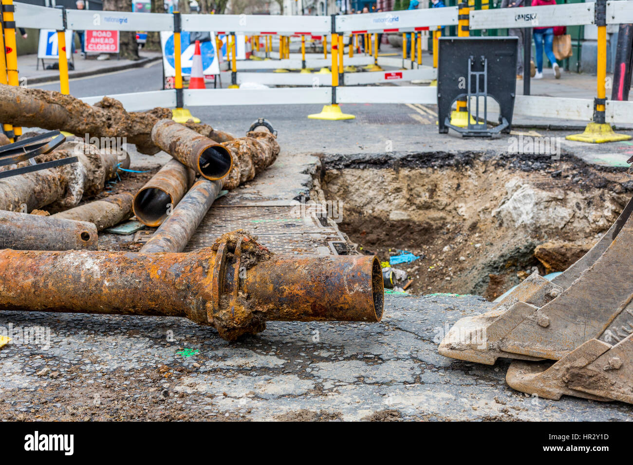 Road works infrastructure  old pipe replacement causes traffic jams and delays in London England UK Stock Photo