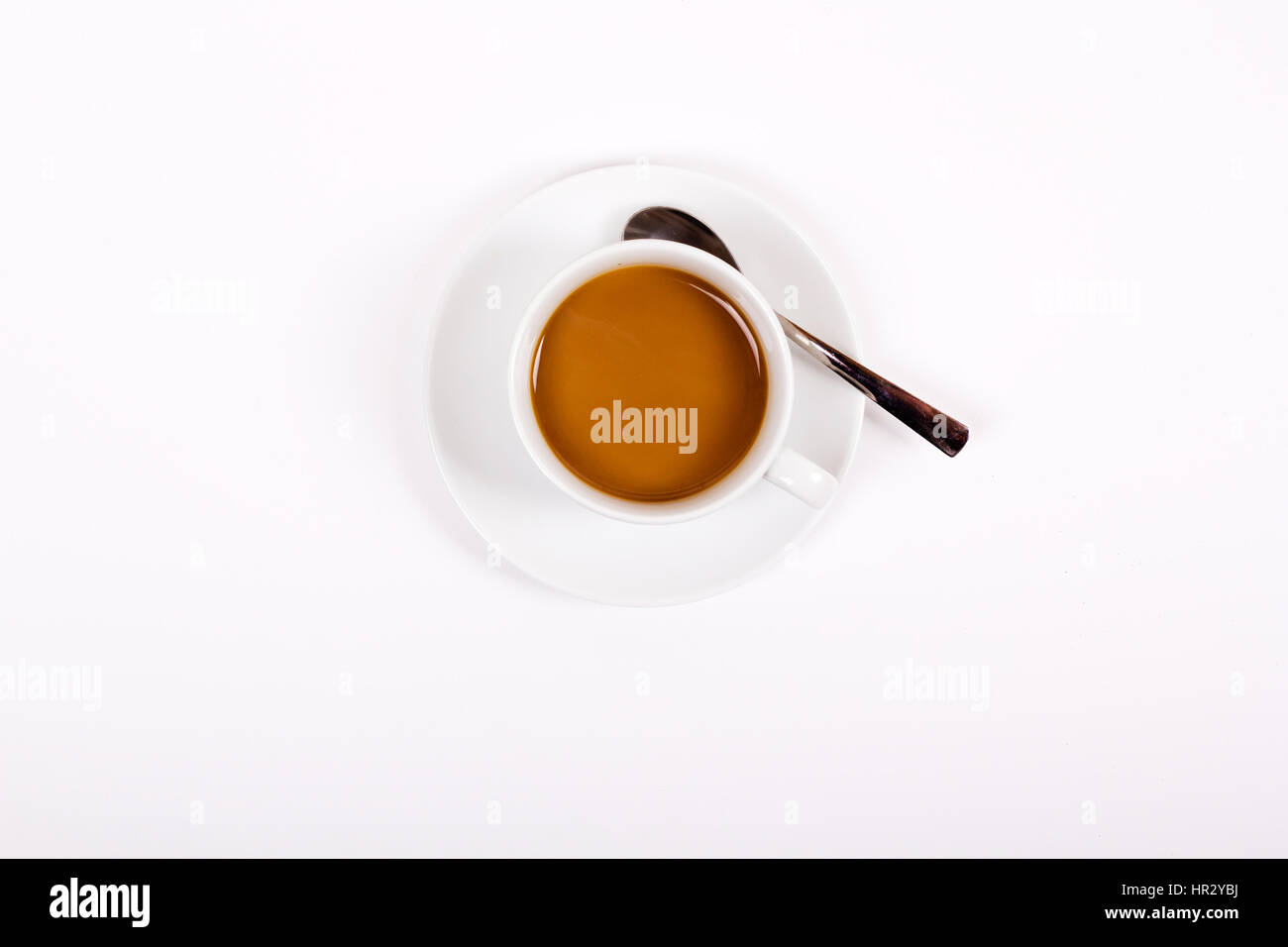Coffee in white cup and saucer on a white background Stock Photo - Alamy
