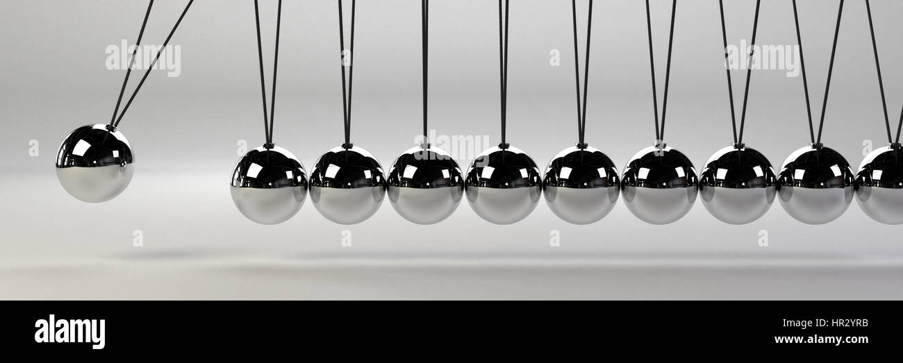 cause and effect concept banner, metal Newton's cradle on a white background Stock Photo