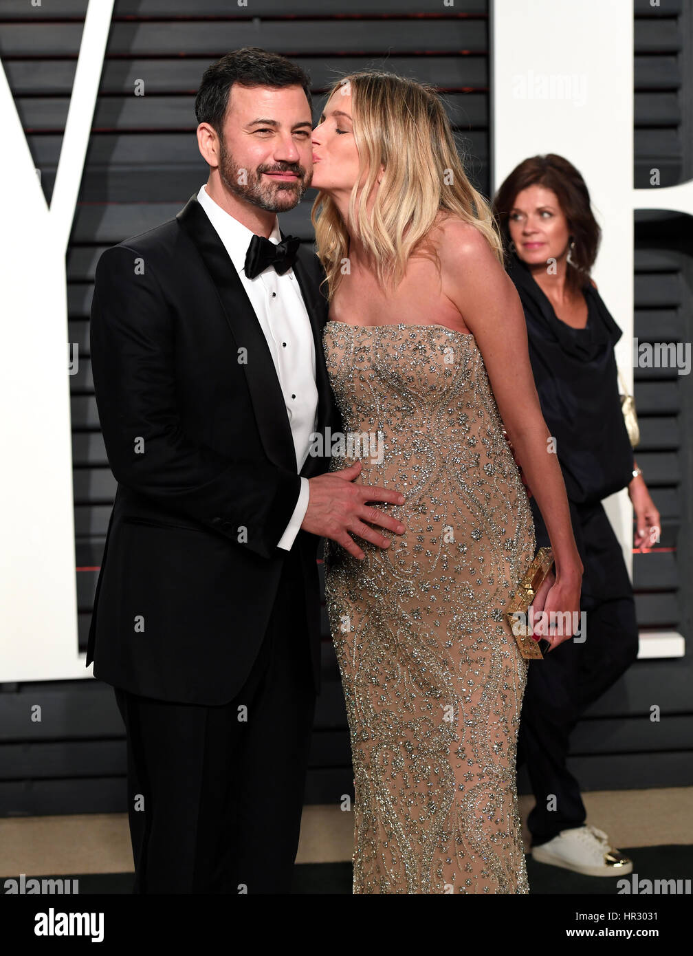 Jimmy Kimmel and Molly McNearney arriving at the Vanity Fair Oscar Party in Beverly Hills, Los Angeles, USA. Stock Photo