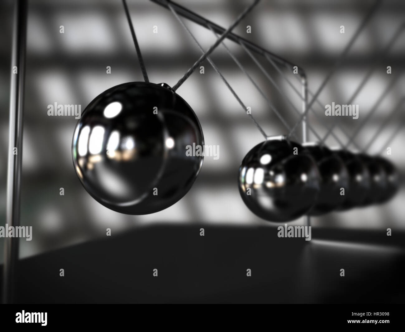 Newton's cradle in motion Stock Photo