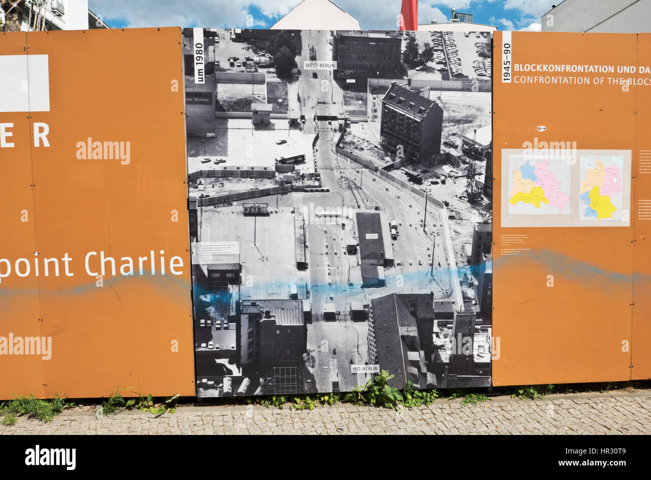 Large posters on display about the Check Point Charlie Guard Post, Berlin, Germany Stock Photo