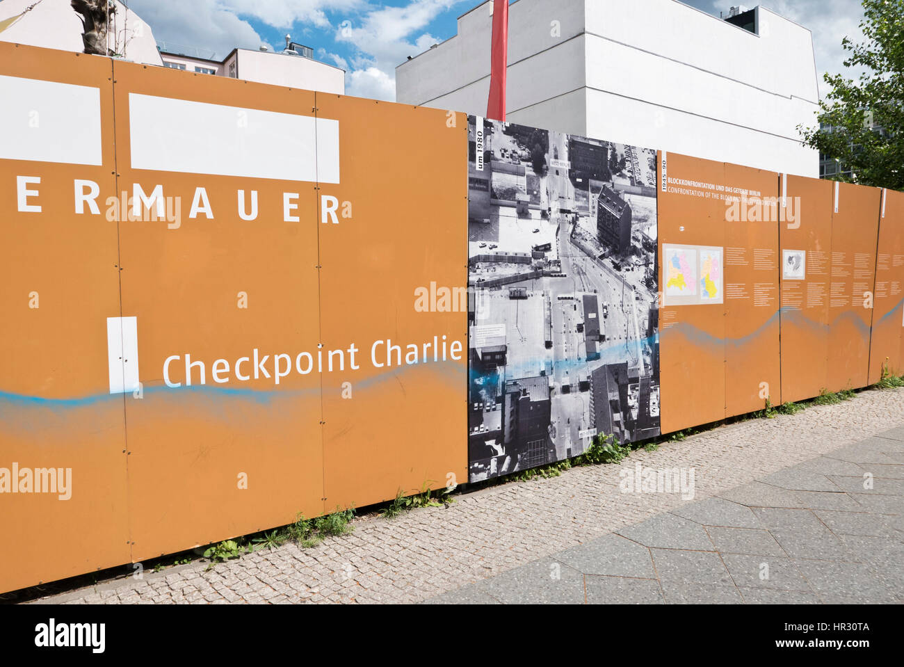 Large posters on display about the Check Point Charlie Guard Post, Berlin, Germany Stock Photo