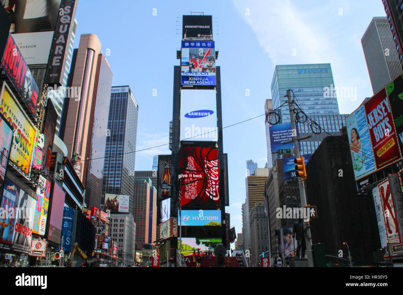 NEW YORK, USA - April 25, 2014: Time Square with large amount of led commercial advertisement at early in the morning. Stock Photo