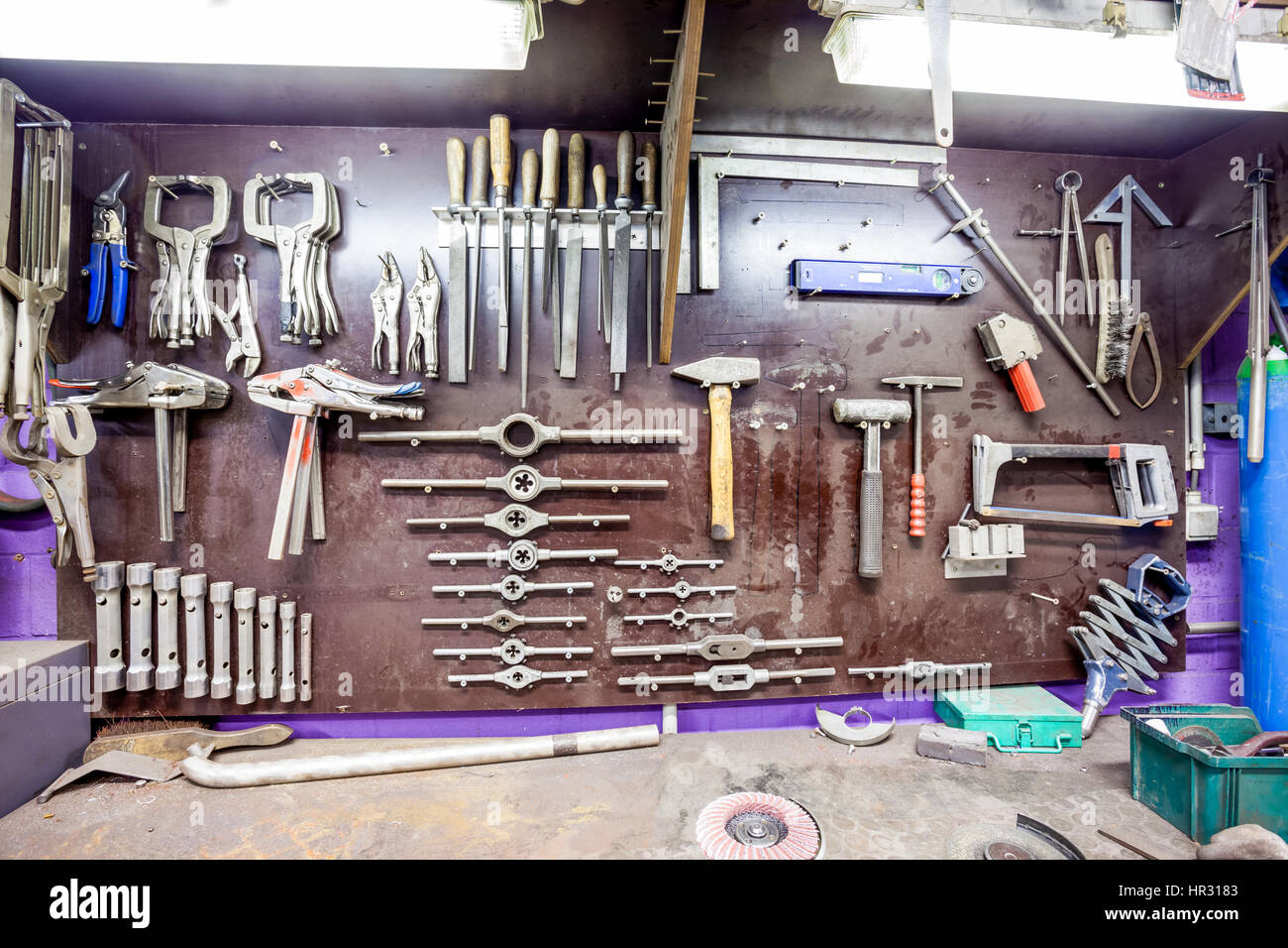 in a workshop of metal, this old workbench Stock Photo