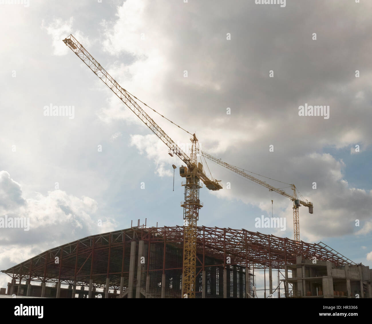 two tower crane on the construction site Stock Photo