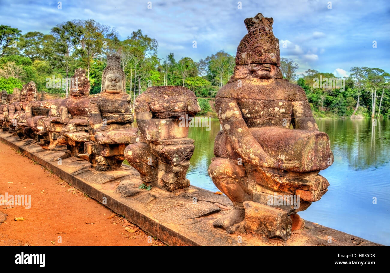 Guardians at the South Gate of Angkor Thom - Siem Reap, Cambodia Stock Photo