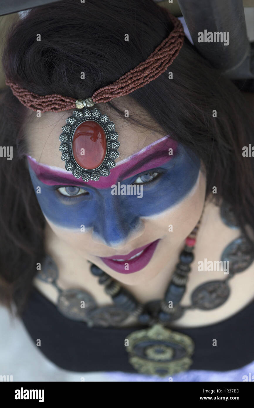 Portrait of young woman with face paint Stock Photo - Alamy