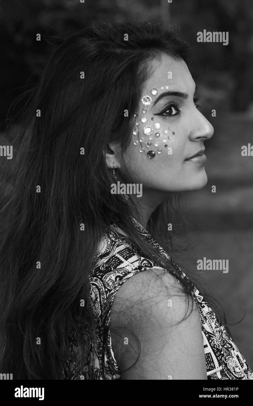 One young woman showing Black and White Stock Photos & Images - Alamy