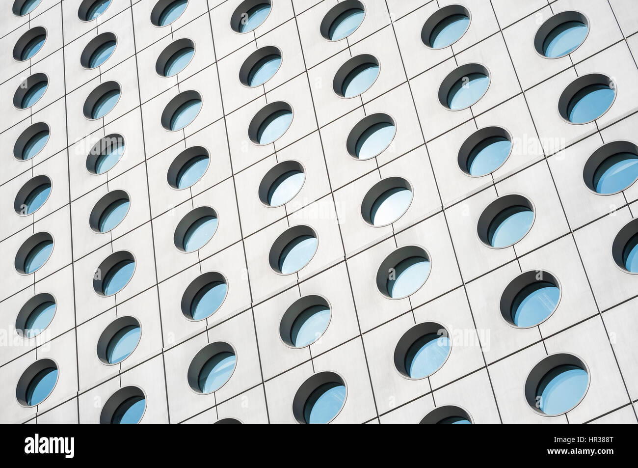 Closeup view of the distinctive circular windows of Jardine House, Hong