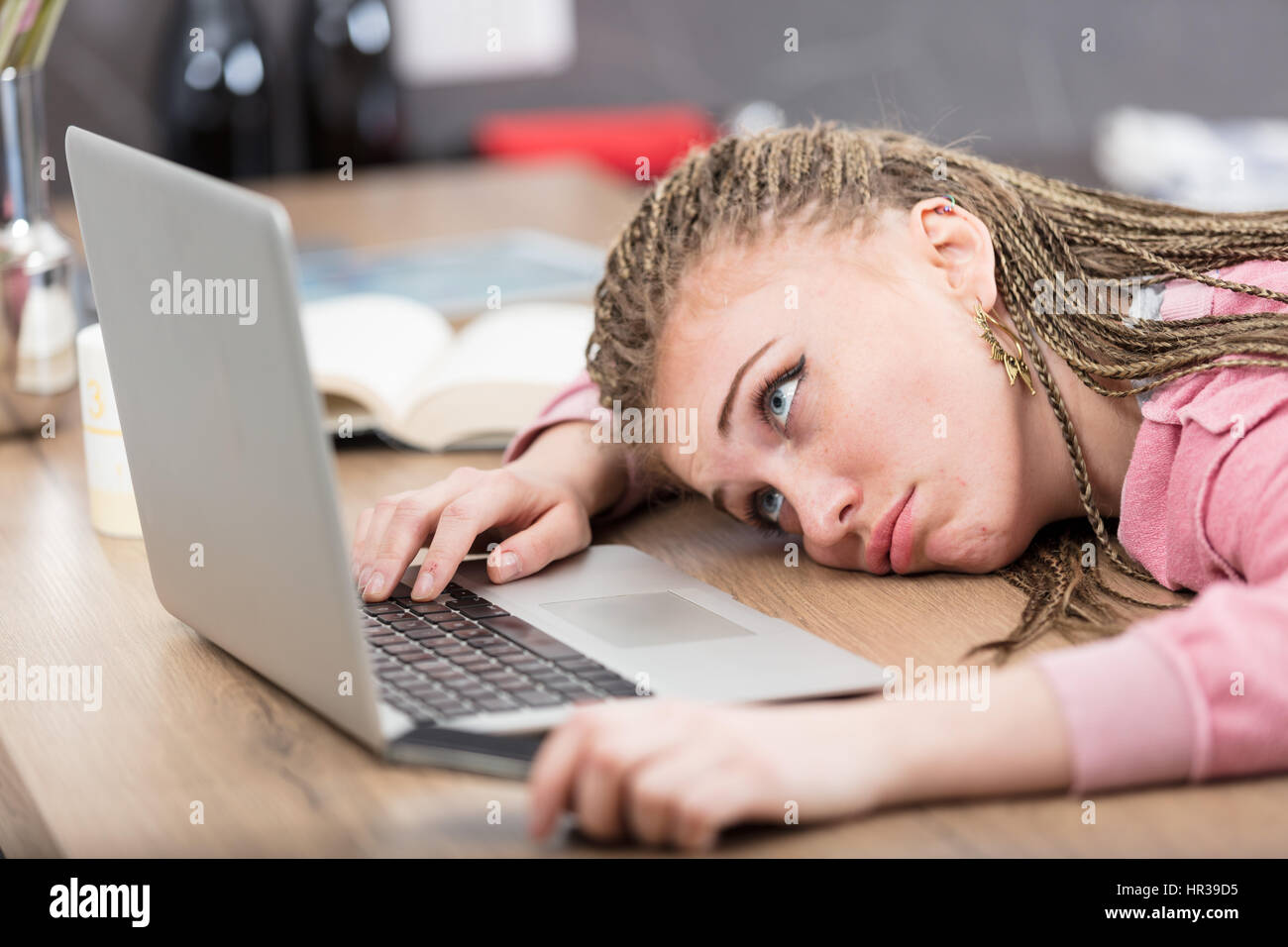 Tired Woman In Front Of A Laptop Computer In A Kitchen Bored Or Tired Because Of Her Unsuccessful Information Search Stock Photo Alamy