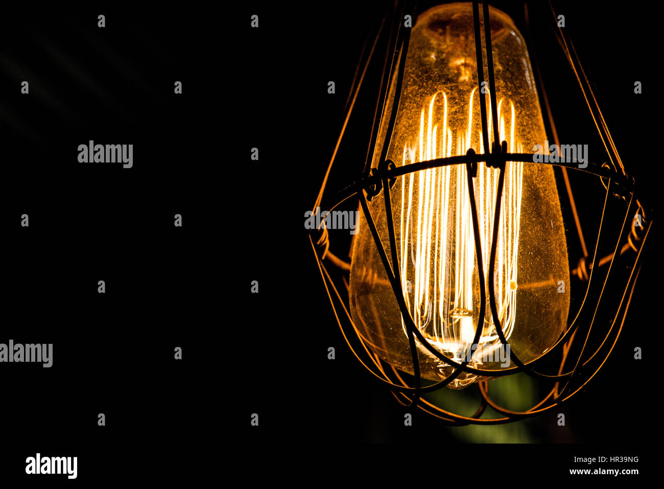 Light bulb with chain hanging from the ceiling Stock Photo Alamy