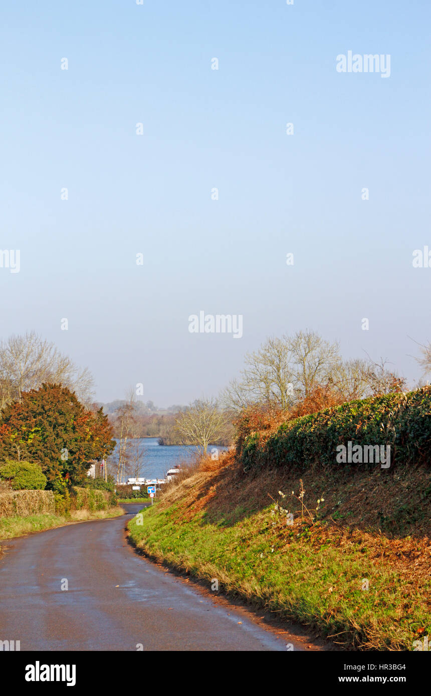 A view of Malthouse Broads from a country lane at Ranwirth, Norfolk, England, United Kingdom. Stock Photo