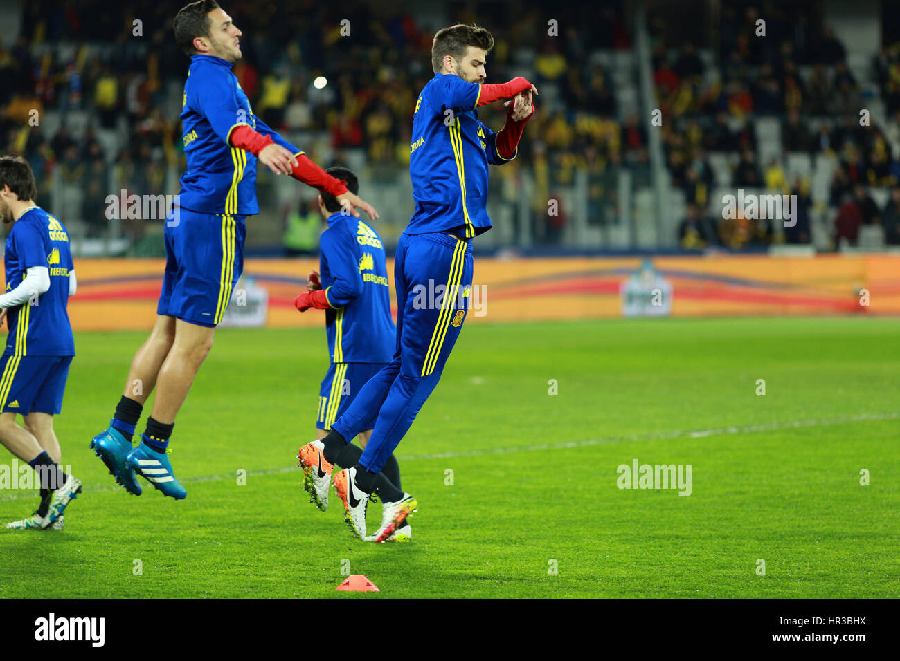 CLUJ-NAPOCA, ROMANIA - MARCH 27, 2016: Soccer players of the National Team of Spain exercising during the warm-up session before a match against Roman Stock Photo