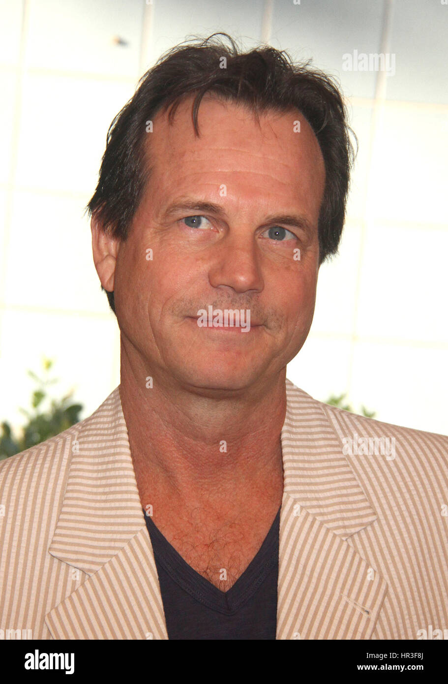 February 26, File - WILLIAM 'BILL' PAXTON (May 17, 1955 - February 25, 2017) was an American actor and director. The films in which he appeared include The Terminator (1984), Weird Science (1985), Aliens (1986), Predator 2 (1990), True Lies (1994), Apollo 13 (1995), Twister (1996), and Titanic (1997). Paxton also starred in the HBO series Big Love (2006Ð2011) and was nominated for an Emmy Award for the miniseries Hatfields & McCoys. Paxton died from complications during heart surgery during post-op and suffered a fatal stroke. Pictured: July 29, 2013 - New York, New York, U.S. - Actor BILL PAX Stock Photo
