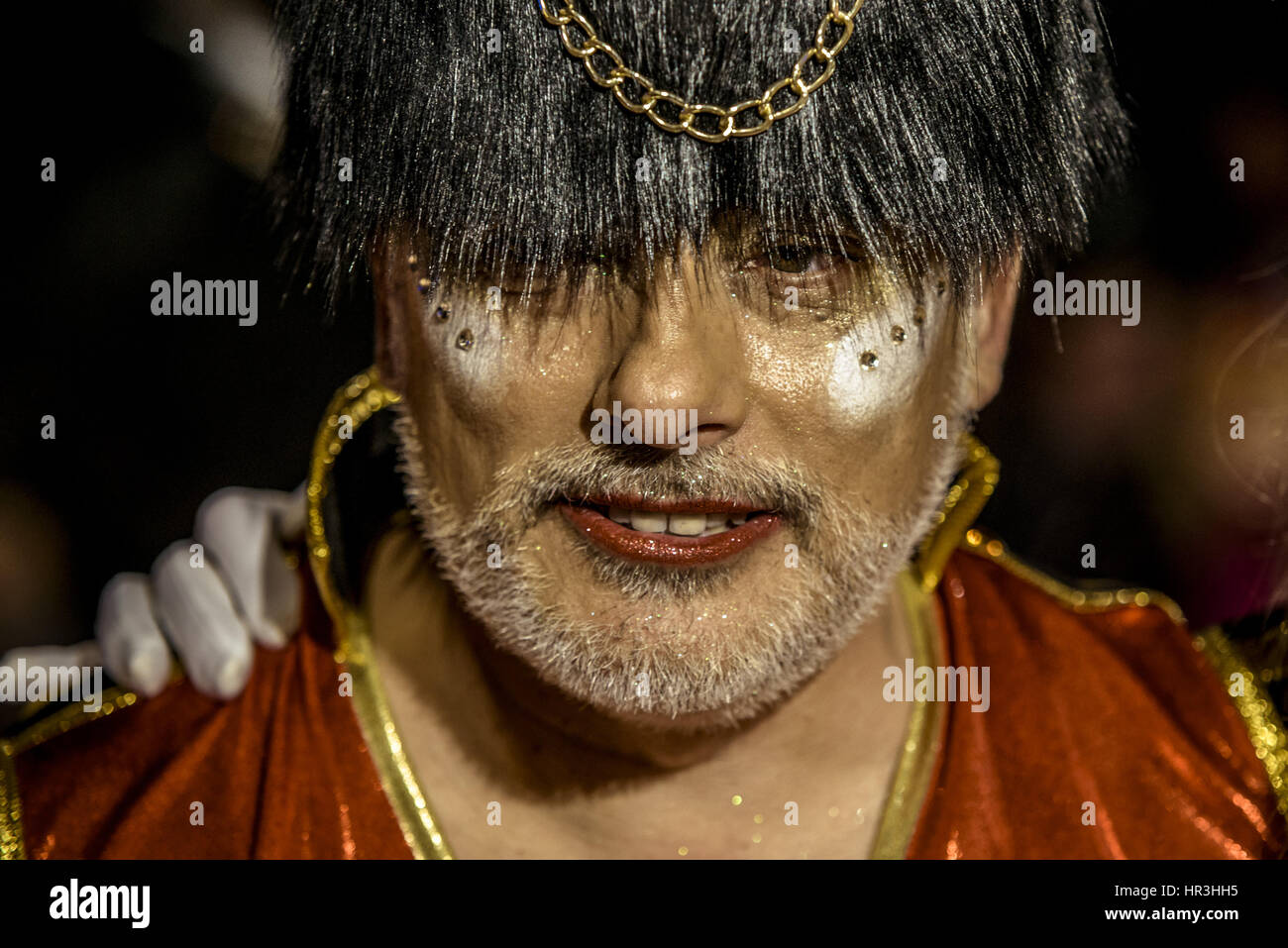 Sitges, Catalonia, Spain. 26th Feb, 2017. A reveller with a bearskin cup takes part in the annual 'Parade of Debauchery' of the carnival in Sitges spoofing the 'Brexit' Credit: Matthias Oesterle/ZUMA Wire/Alamy Live News Stock Photo