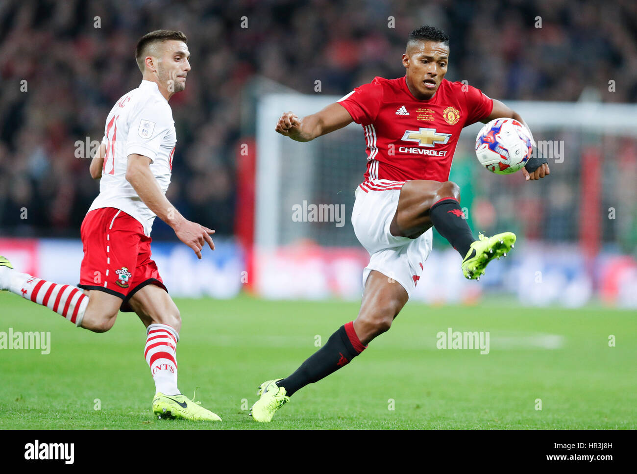 London, UK. 26th Feb, 2017. Manchester United's Antonio Valencia (R) controls the ball during the EFL Cup Final between Manchester United and Southampton at Wembley Stadium in London, Britain on Feb. 26, 2017. Credit: Han Yan/Xinhua/Alamy Live News Stock Photo