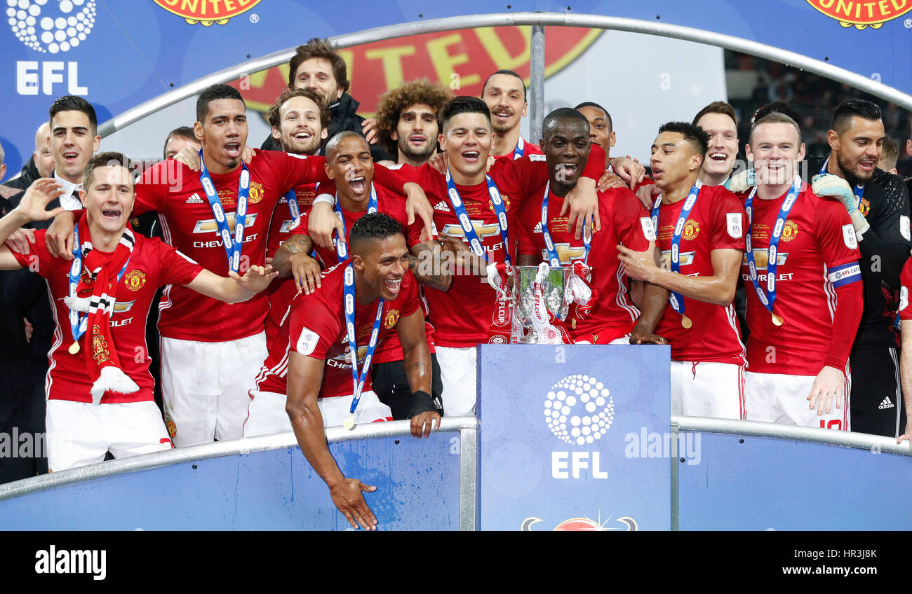 London, UK. 26th Feb, 2017. Players of Manchester United celebrate with their trophy after winning the EFL Cup Final between Manchester United and Southampton at Wembley Stadium in London, Britain on Feb. 26, 2017. Credit: Han Yan/Xinhua/Alamy Live News Stock Photo