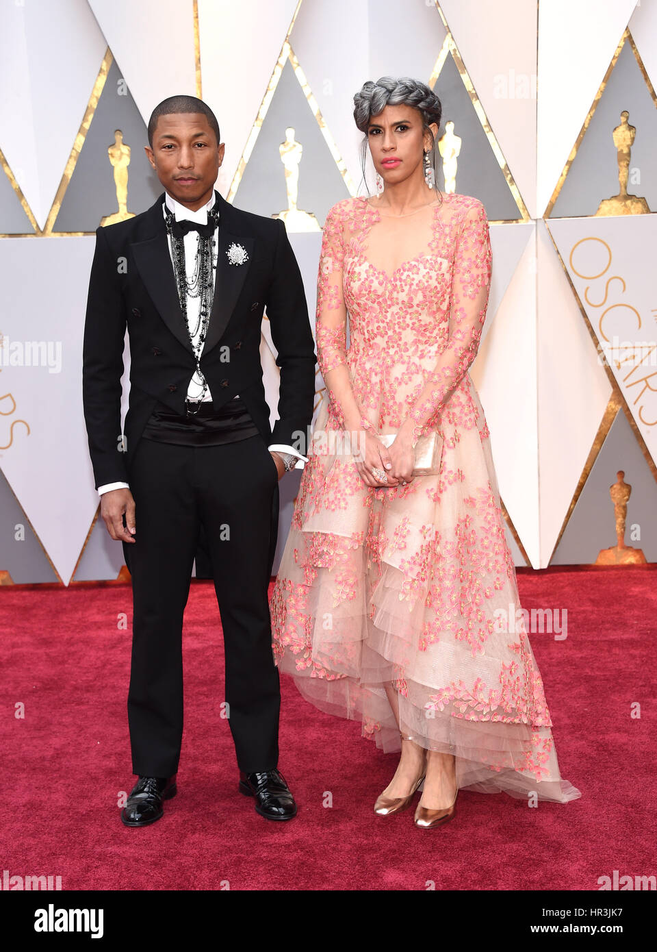 Hollywood, California, USA. 26th Feb, 2017. PHARRELL WILLIAMS and MIMI VALDES during red carpet arrivals for the 89th Academy Awards ceremony. Credit: Lisa O'Connor/ZUMA Wire/Alamy Live News Stock Photo