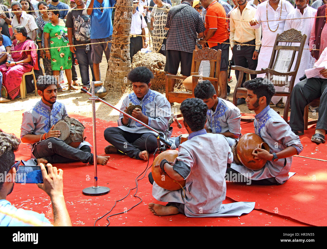Siridao Beach, Goa, India. 26th February, 2017. Troupe of boys perform traditional music at Ghumatachem Fest 2017, a festival to revive the musical instrument, Ghumat, a traditional percussion instrument of Goa, India. MathewJoseK/Alamy Live News Stock Photo
