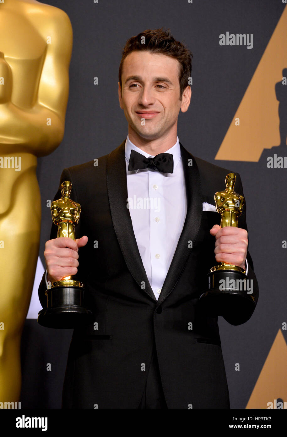 Los Angeles, USA. 26th Feb, 2017. LOS ANGELES, CA. February 26, 2017: Justin Hurwitz in the photo room at the 89th Annual Academy Awards at the Dolby Theatre, Los Angeles. Credit: Sarah Stewart/Alamy Live News Stock Photo