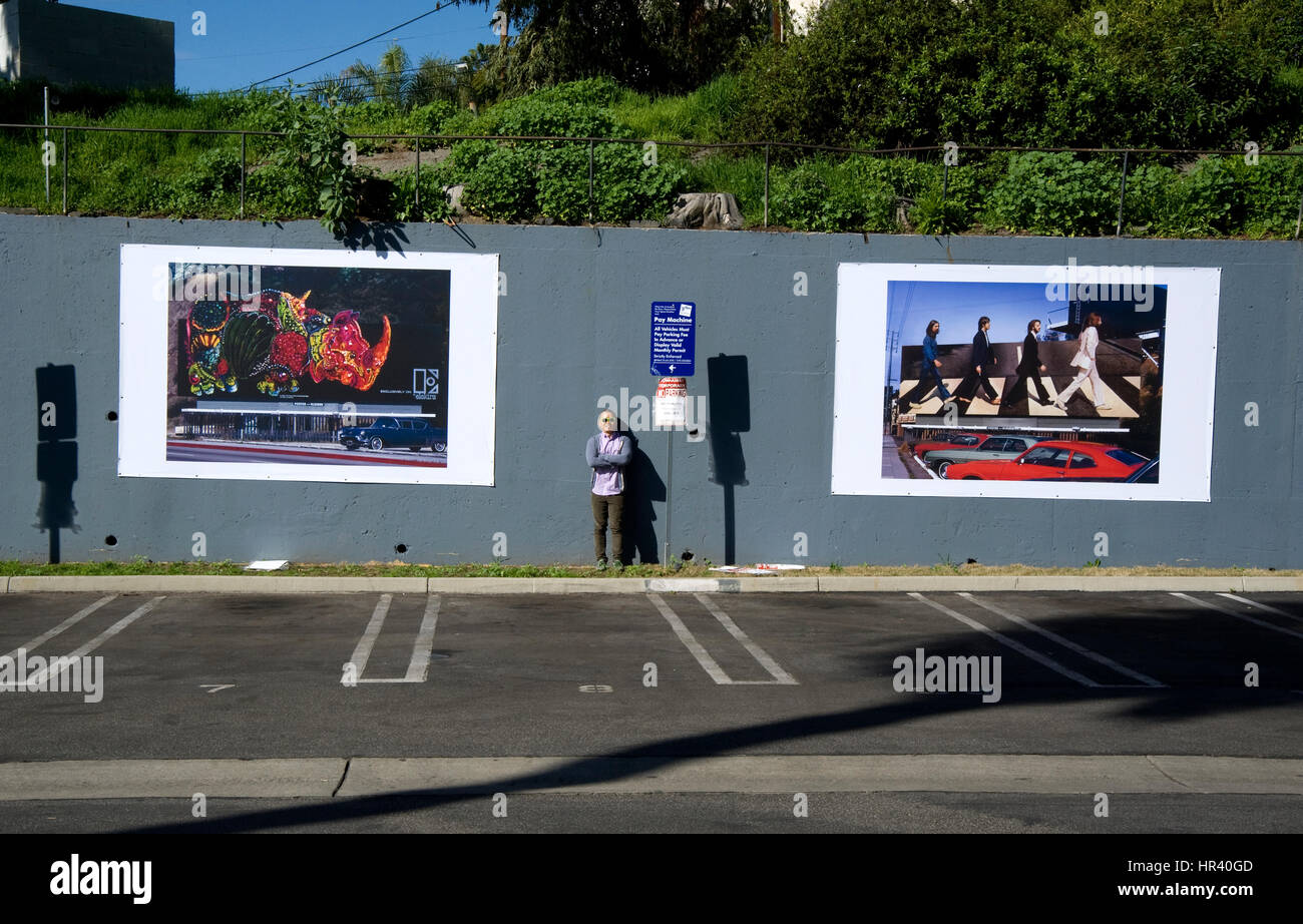 Installation of outdoor art exhibit on the Sunset Strip in Los Angeles featuring Robert Landau's photos documenting  rock billboards from the 1970s. Stock Photo