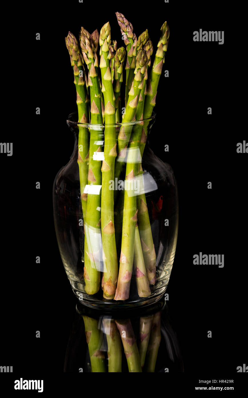 Asparagus displayed like flowers in a glass vase Stock Photo Alamy