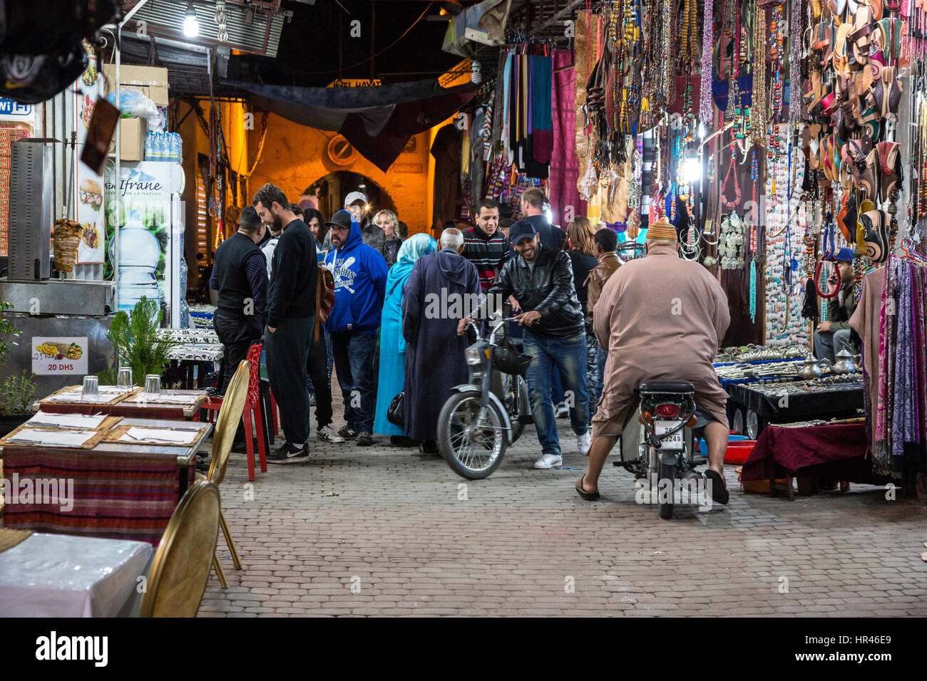 Marrakesh, Morocco.  Zeitoun El-Kedim Street, Pedestrian and Vehicular Traffic. Stock Photo