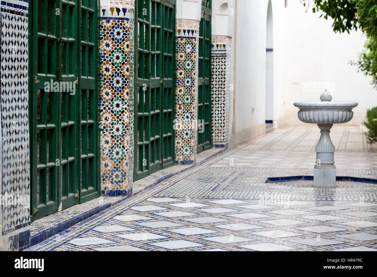 Marrakesh, Morocco.  Bahia Palace, 19th. Century.  Fountain and Tile Work in Inner Courtyard. Stock Photo