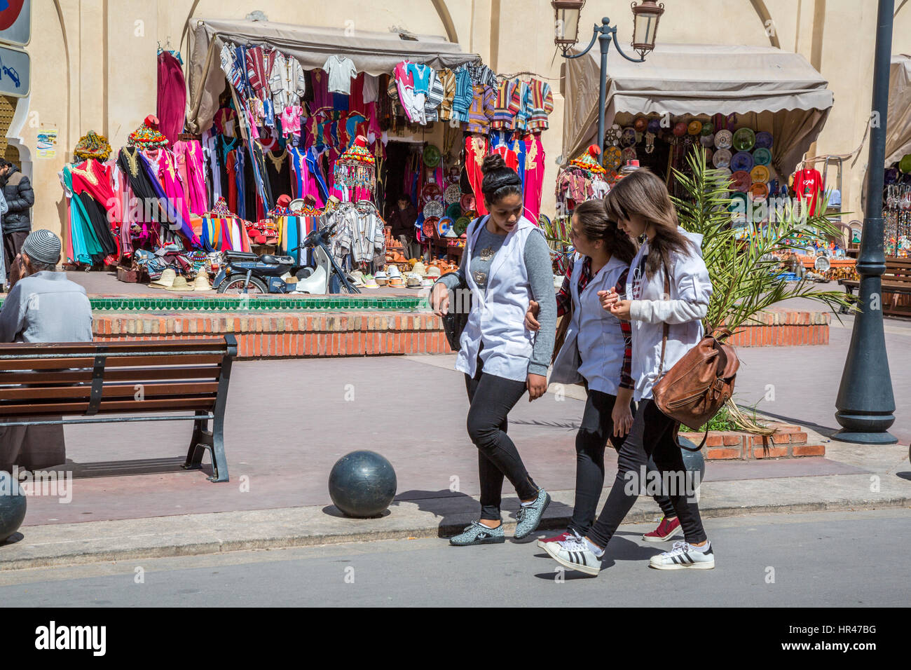 Marrakesh, Morocco.  Three Young Moroccan Women Walking near the Saadian Tombs. Stock Photo