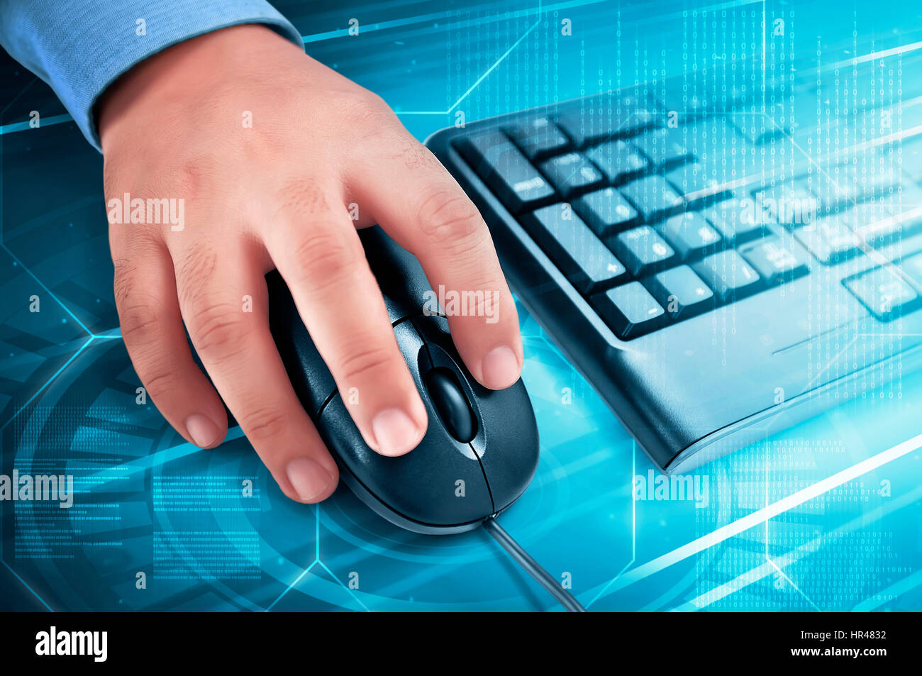 Male hand on computer mouse with keyboard beside him over blue digital  background Stock Photo - Alamy