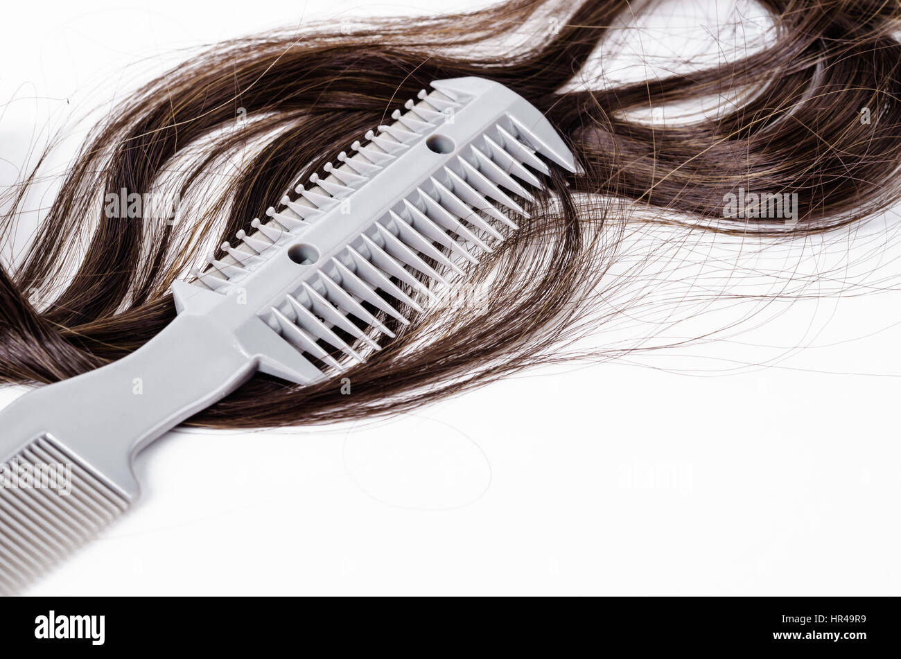 Comb slice hair with blade and hairs on white background Stock Photo ...