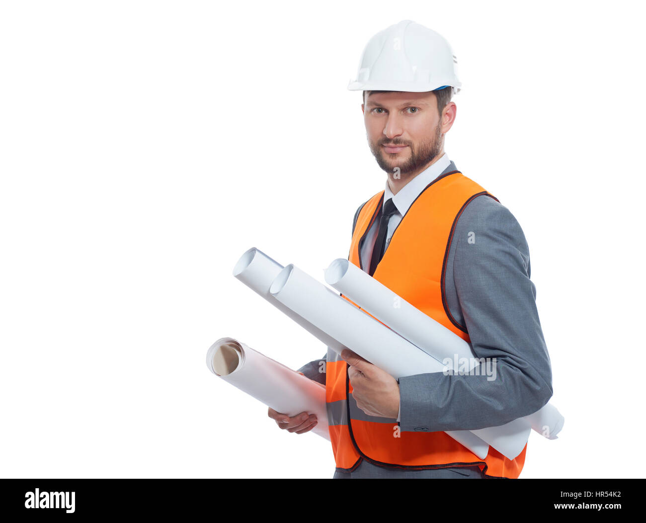 Your professional. Friendly mature businessman construction foreman smiling confidently holding blueprints wearing protective hardhat and safety vest  Stock Photo