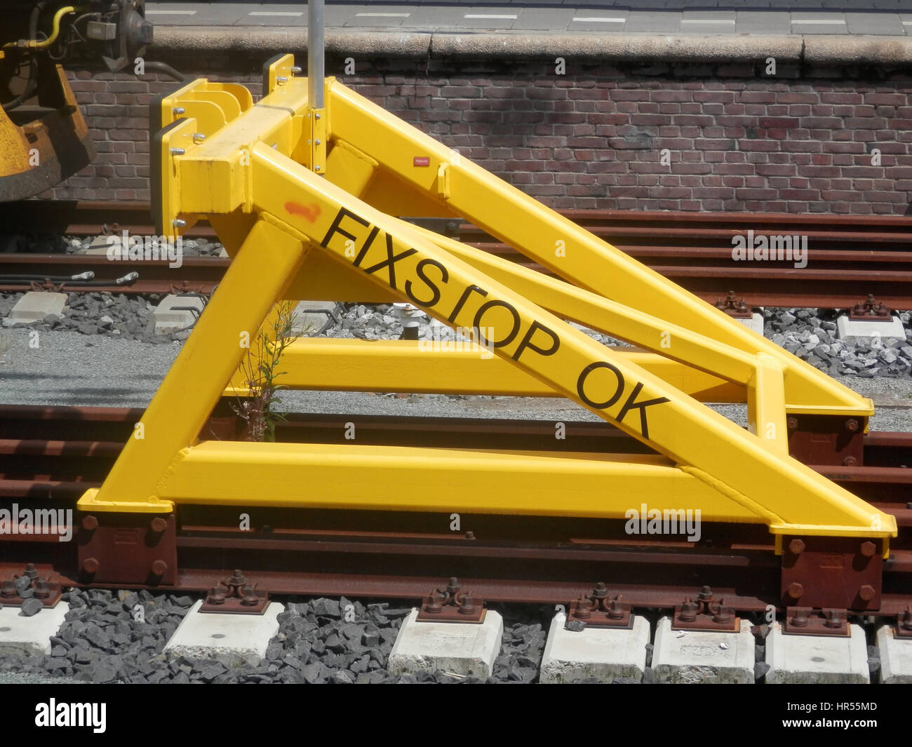 Yellow steel railway buffer in Maastricht station, Holland Stock Photo