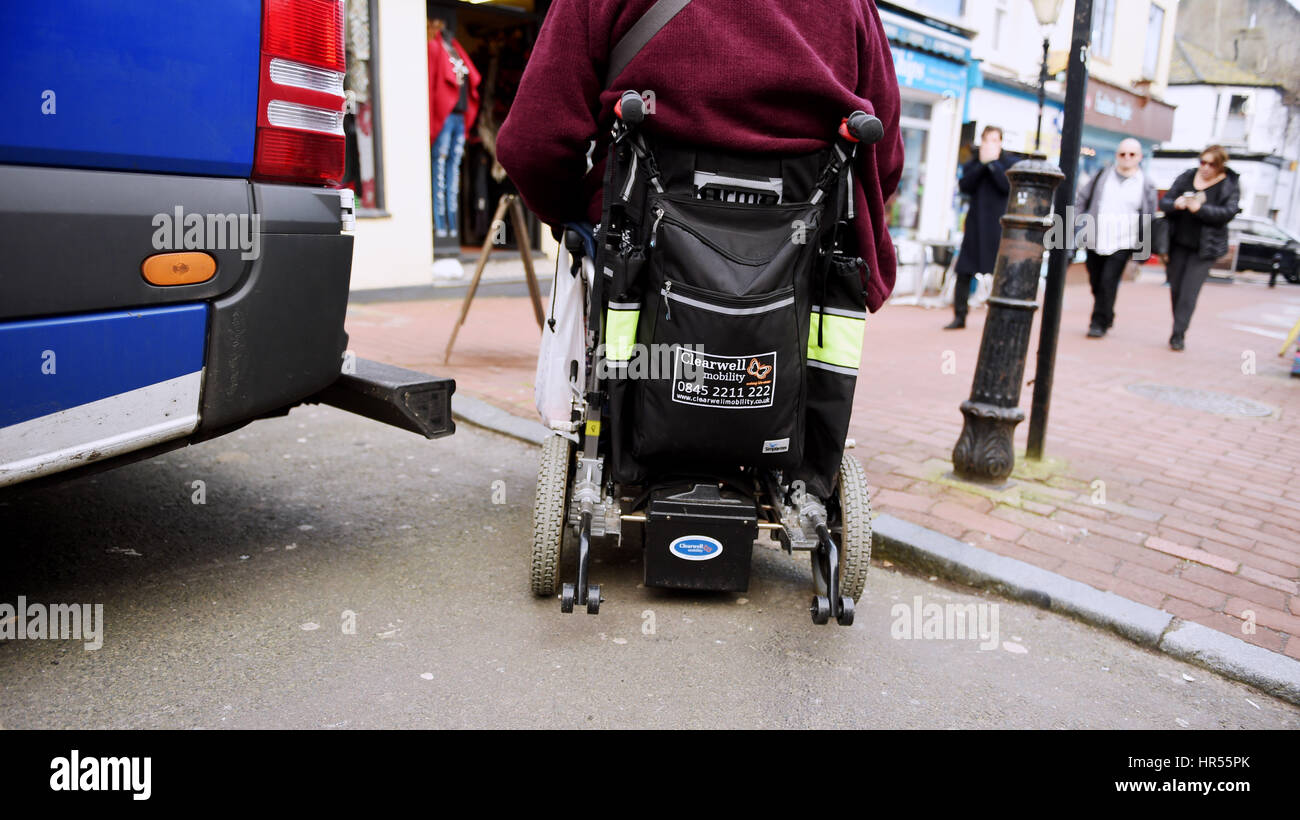 Wheelchair users  have problems with the uneven road and pavement surfaces in Brighton UK Stock Photo
