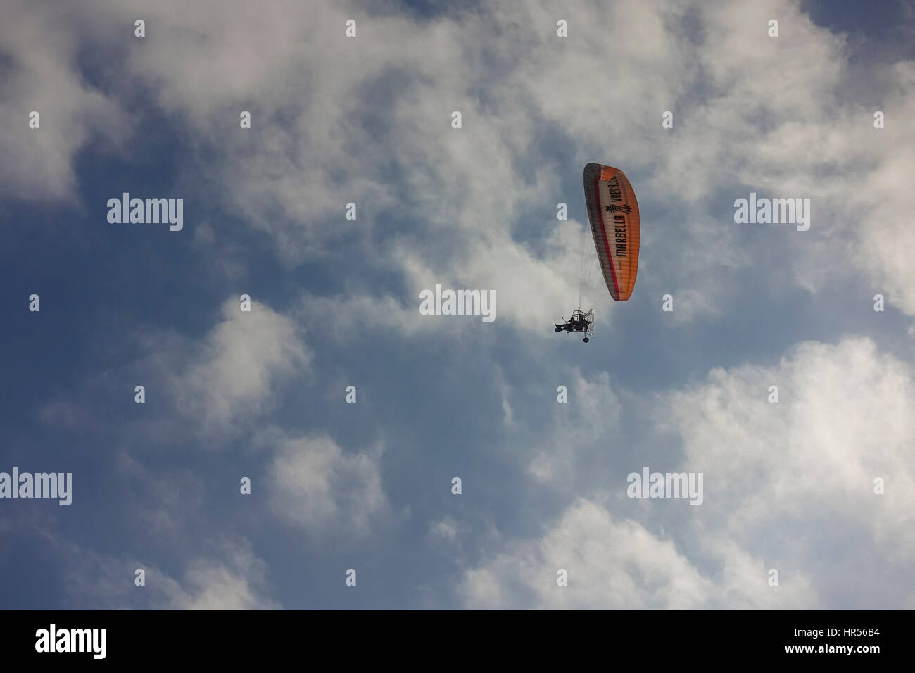 Powered paragliding,  paramotoring, Powered paraglider. during sunset, Spain. Stock Photo