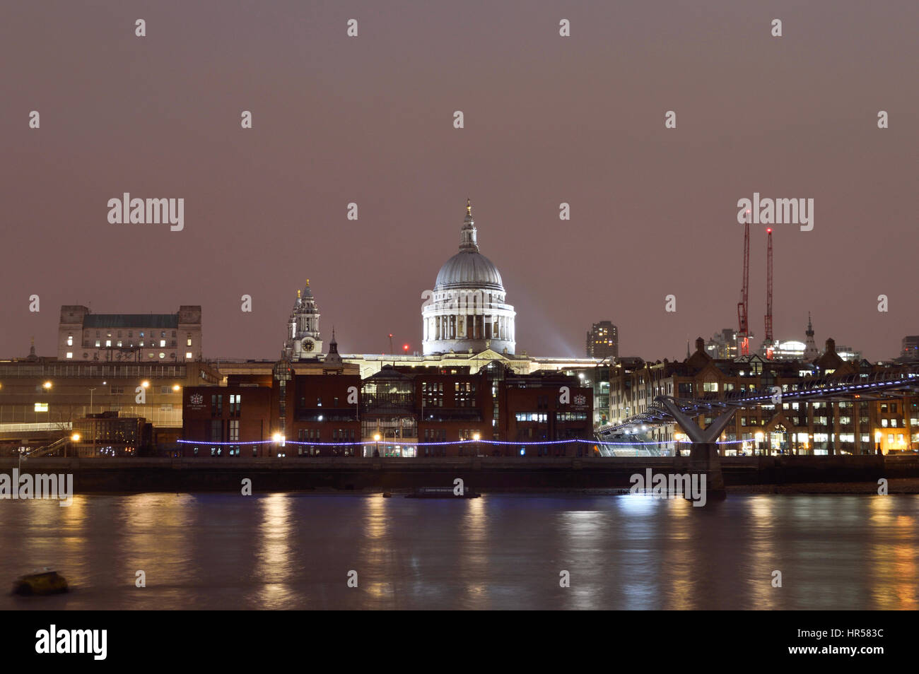 View over the Thames river to St Paul's cathedral at night, London, cityscape, UK Stock Photo
