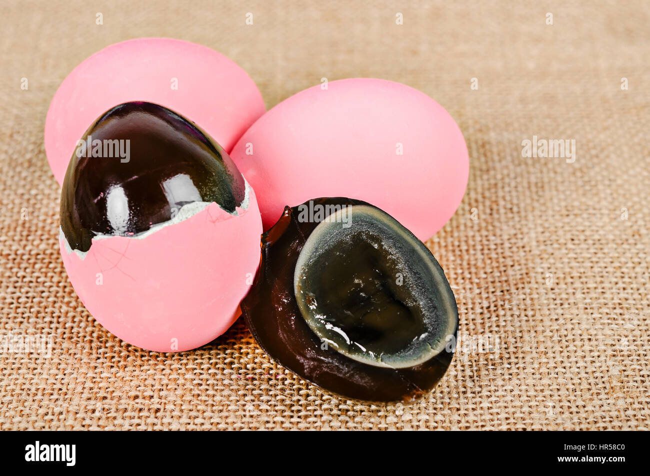 Thousand egg, Preserving Duck on sack background. Stock Photo