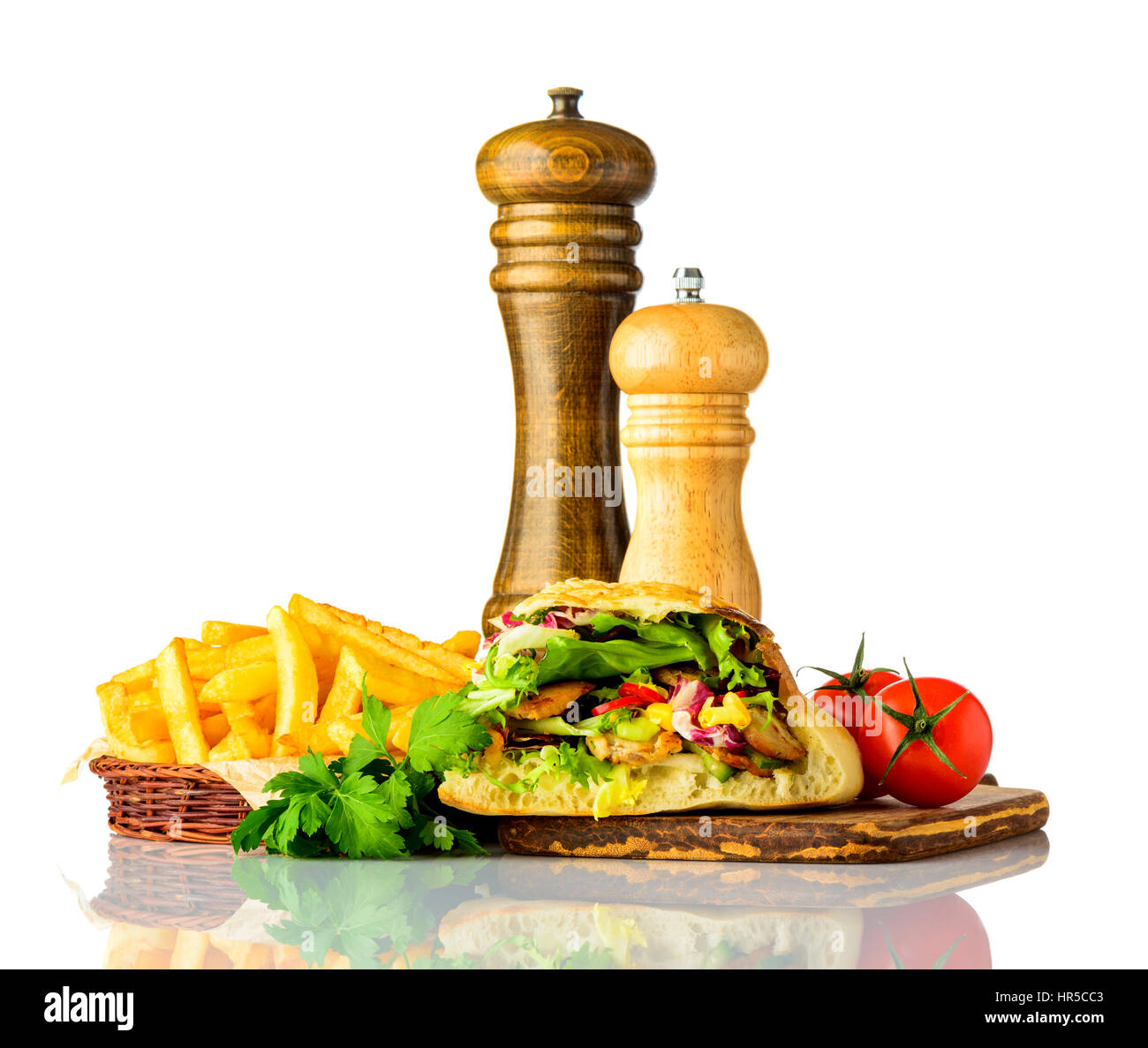 French Fries with Doner Kebap Sandwich and Fresh Vegetables Isolated on White Background Stock Photo