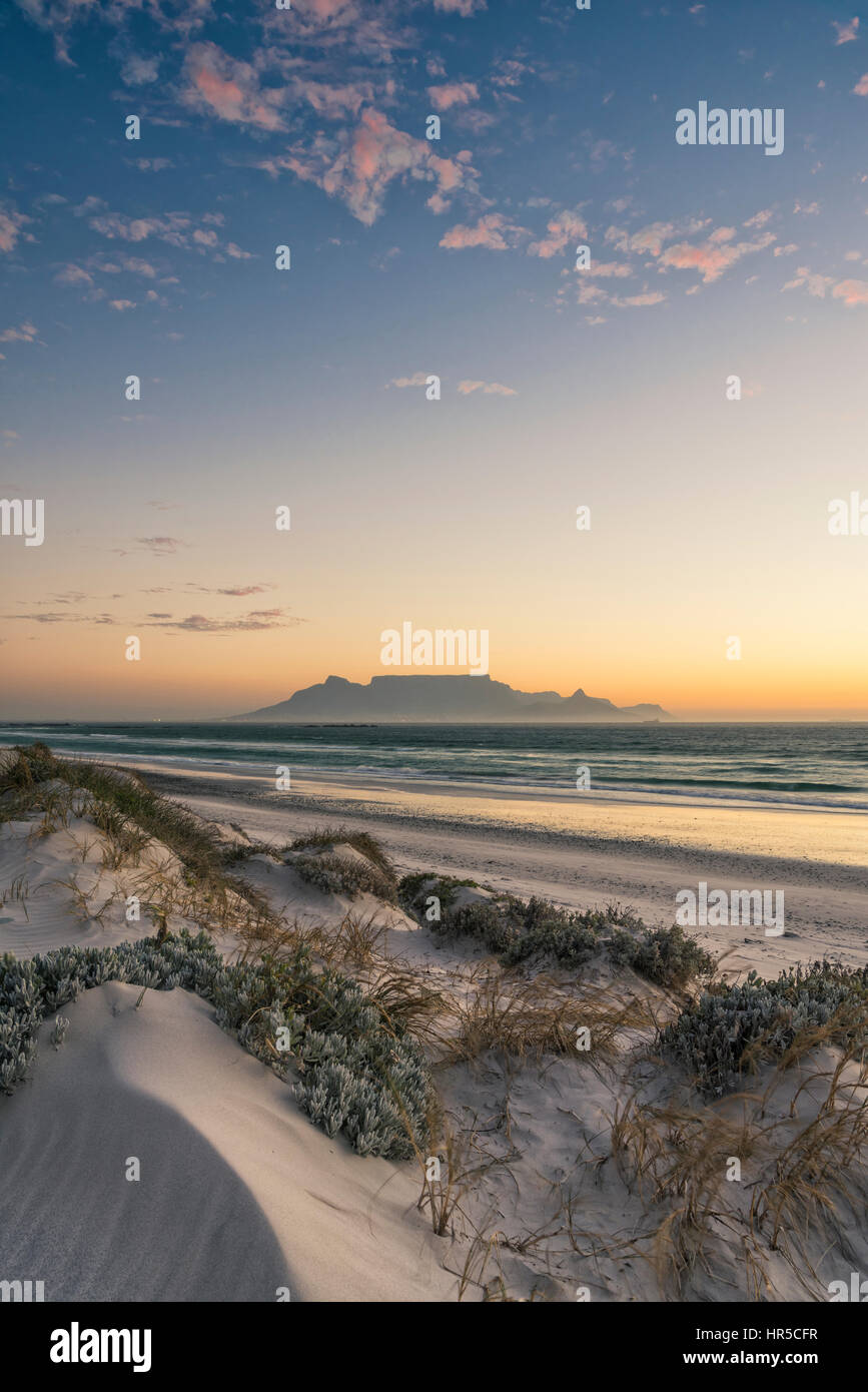 View of Table Mountain at Sunset from Big Bay, Bloubergstrand, Cape Town, South Africa Stock Photo