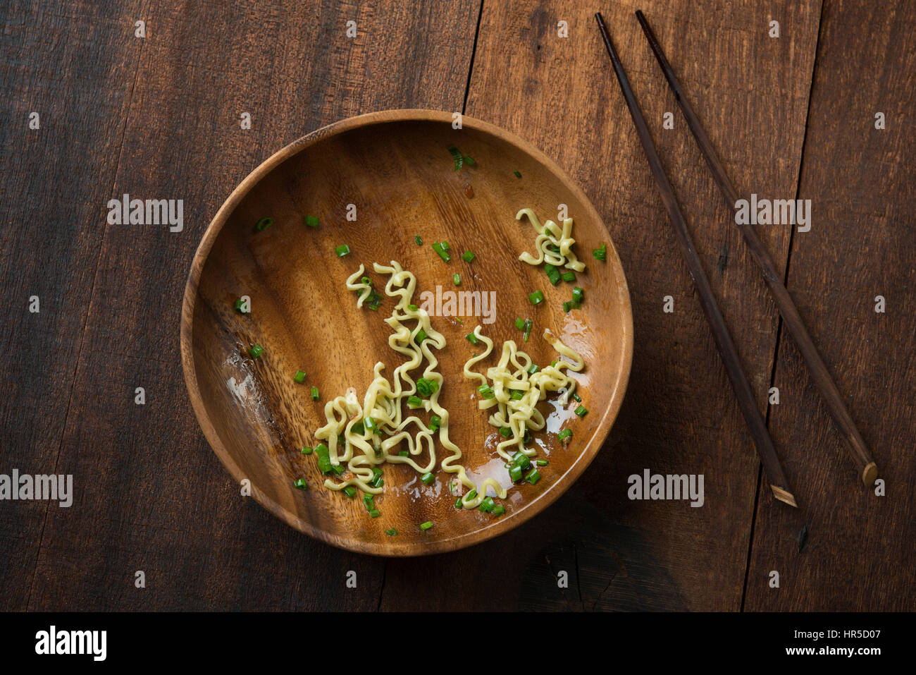 Top view leftover food Japanese ramen dried noodles with chopsticks on