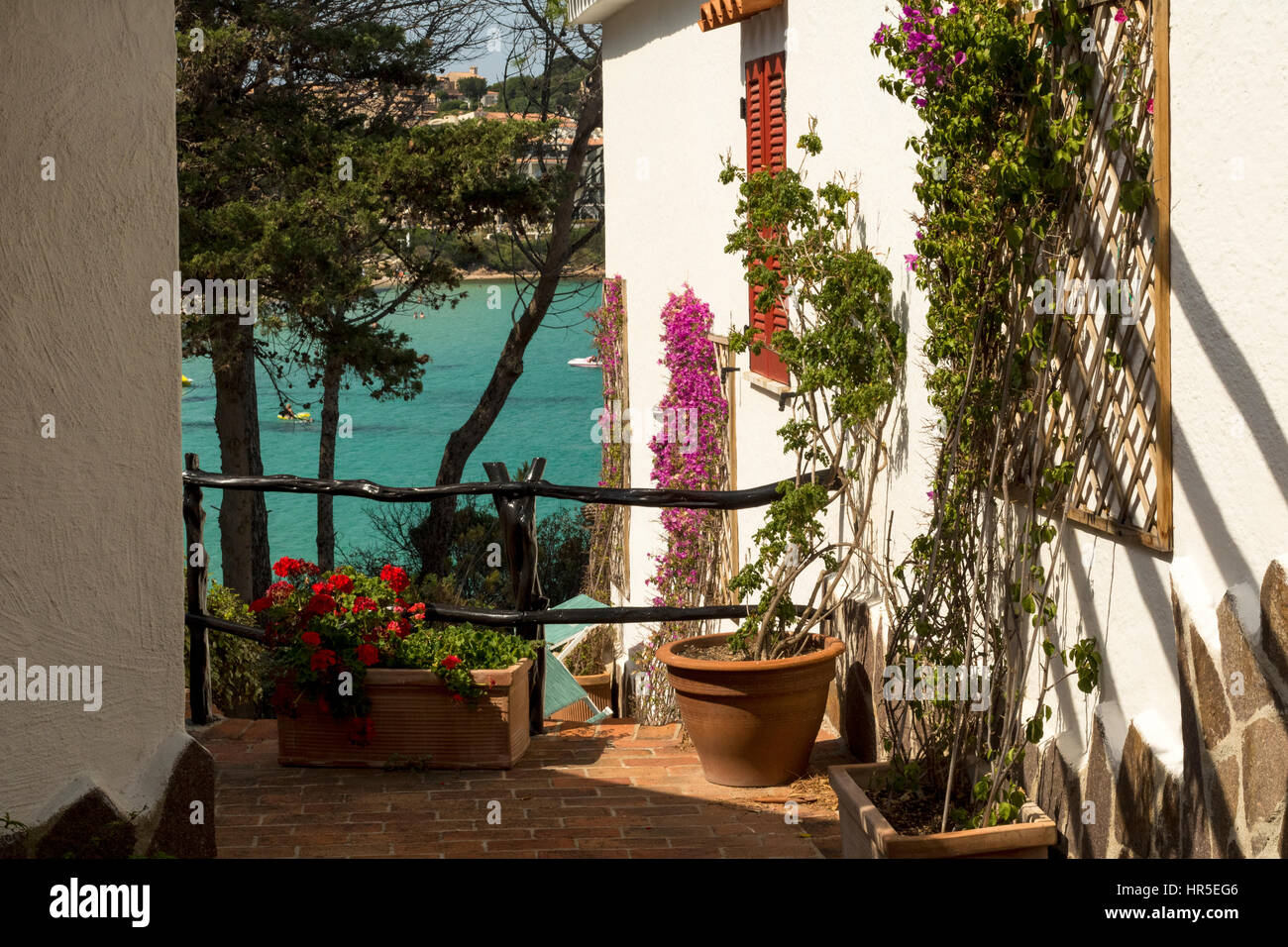 Waterside Cottage, Garden and Sea View, Baia Sardinia, Gallura, Sardinia,  Italy Stock Photo - Alamy