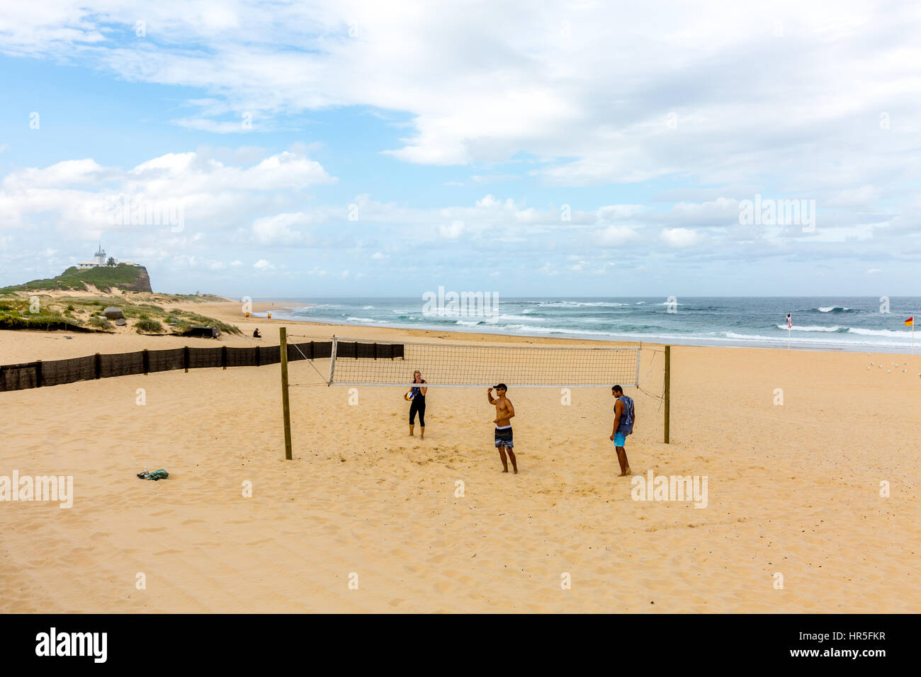 Playing beach volleyball on Nobbys Beach,Newcastle i new south wales,australia Stock Photo
