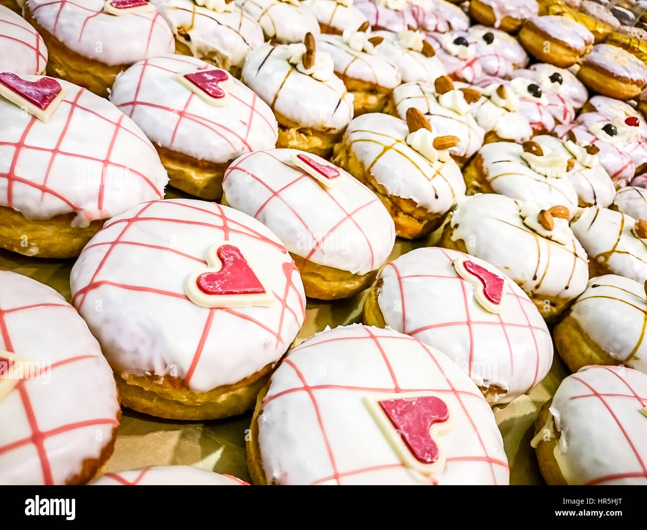Donut with heart of marzipan, soft focus, top view Stock Photo