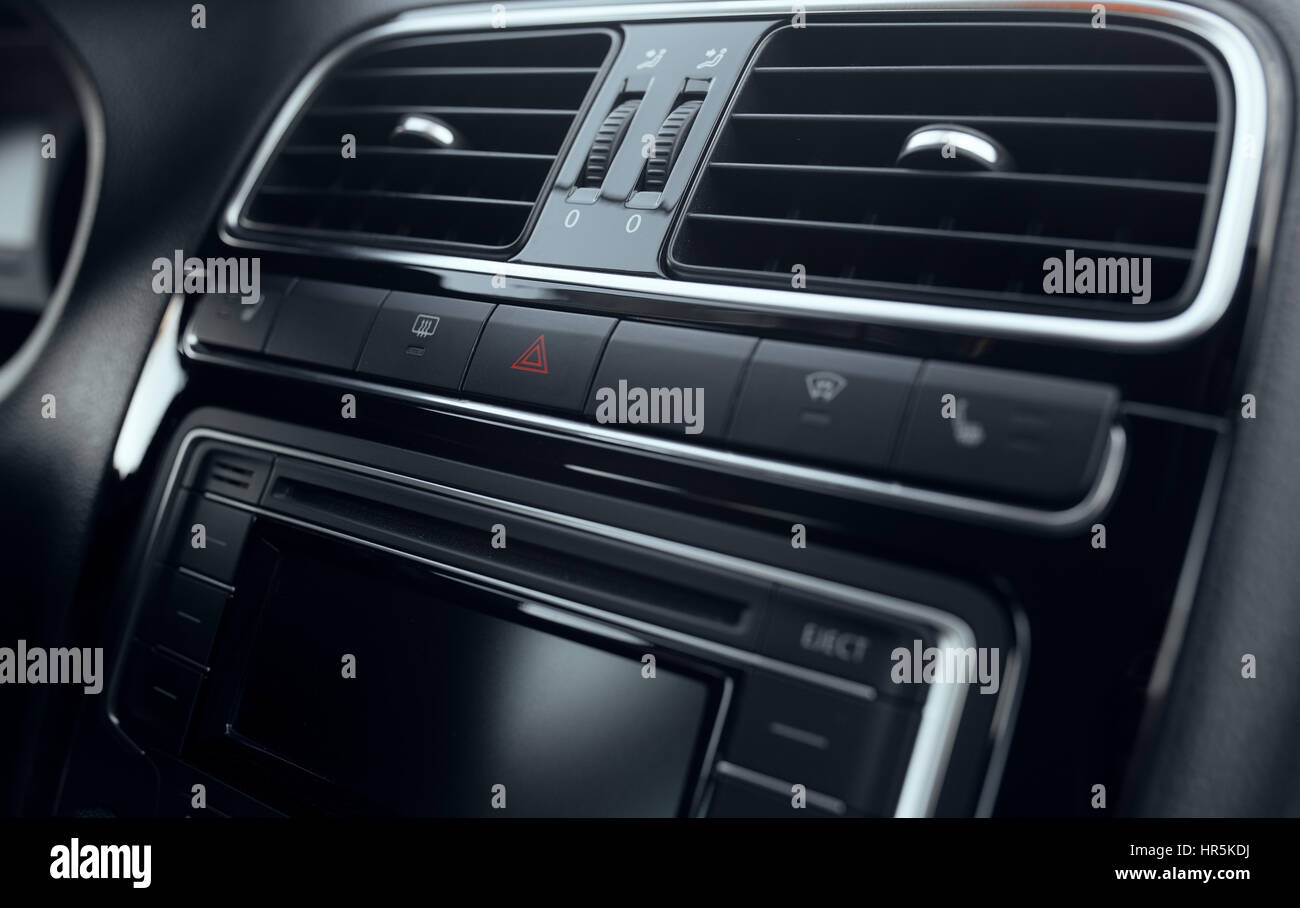 A hand on an indicator stick in the interior of a car also used to turn on  headlights Stock Photo - Alamy